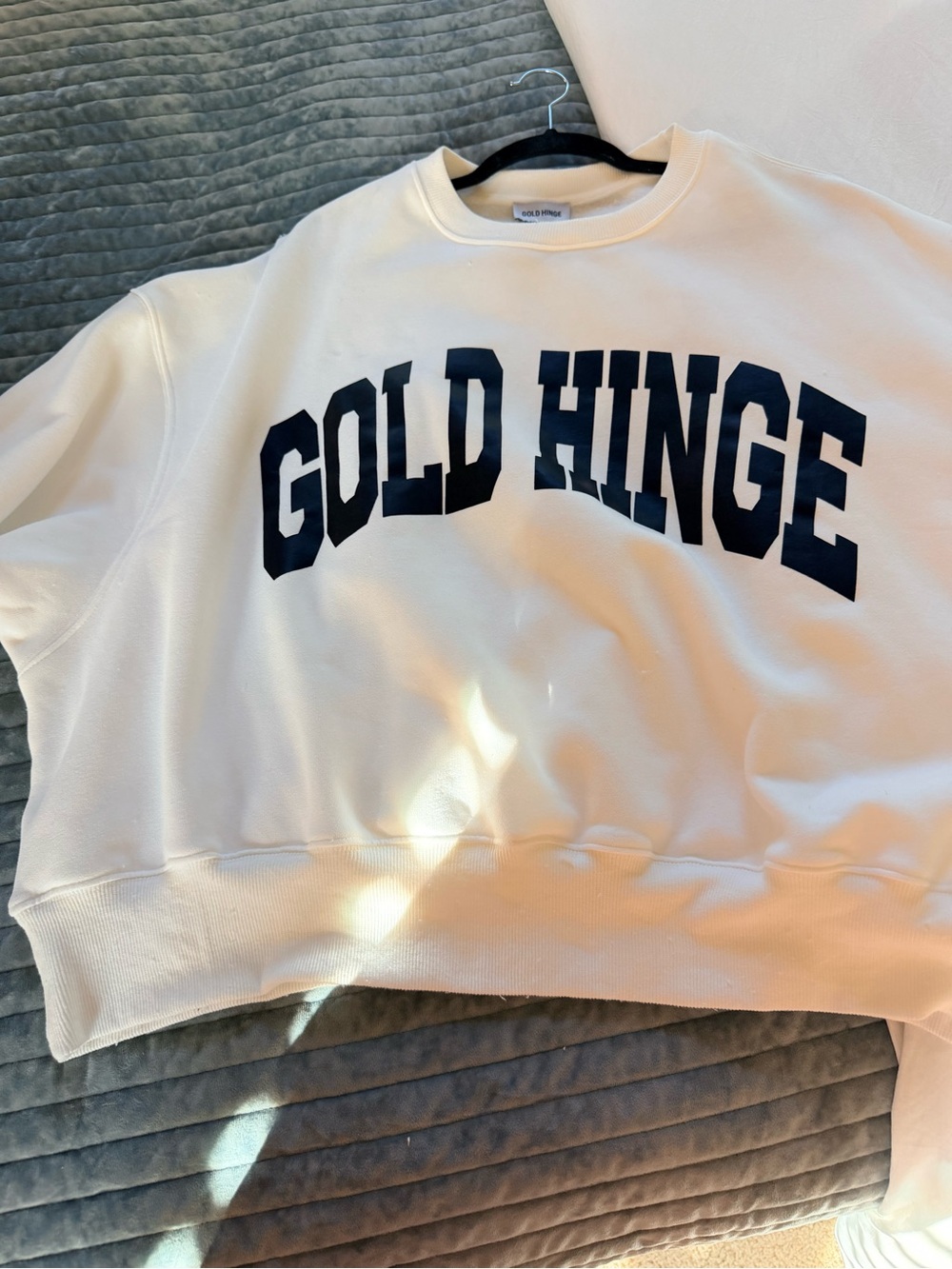Gold Hinge Women's white Logo Crewneck Sweatshirt black letters.